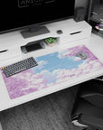 Tranquil artwork on 36x16 desk mat captures the essence of cherry blossoms in serene simplicity