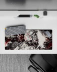 28x12 inches mouse pad with Guts in a chaotic battle against fate, perfect for creating an intense, immersive atmosphere at your desk.