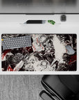 32x16 inches mouse pad with Guts battling fate, featuring blood-soaked chaos and black-and-white artwork with crimson accents.