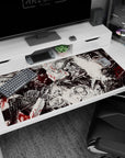 Large 40x20 inches desk pad featuring Guts in a chaotic, blood-soaked scene from Berserk, perfect for fans of dark, intense, and immersive visuals.