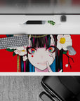 36x16 inches desk mat in bold red with crisp white flowers, teal hair streaks, and playful chaotic vibe.