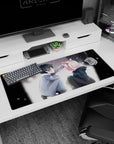 Nostalgic 36x16 anime desk mat with soft snowfall and stolen glance for a warm, emotional setup upgrade