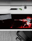 Dramatic black-and-white anime desk pad 36x16 inches with crimson ink bursts, bold edgy mood.