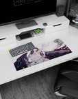 Mouse pad featuring Albedo from Overlord, size 28x12 inches. Showcases her elegant yet fierce demeanor with a feathered backdrop.