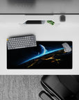 Cool sci-fi desk pad 28x12 inches in inky black, smoky gray, and electric cyan for a calm space vibe.