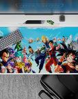 40x20 inches desk pad showcasing Goku, Vegeta, Gohan, and other legendary characters, capturing epic Dragon Ball battles and moments.