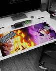 40x20 inches desk mat showing Naruto Uzumaki and Sasuke Uchiha facing off with flame and energy.