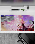Anime desk pad 32x16 inches in purple-peach sunset haze, glowing pink-white angels, dreamy late-night mood.