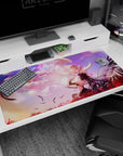 Anime girl desk pad 40x20 inches showing angelic girl facing a dark winged beauty above red spider lilies.