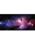 Nebula galaxy desk pad 36x16 inches with swirling clouds, star specks, and sleek dark space backdrop.
