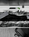 Moody ink-black and bright steel anime desk pad 40x20 inches with deep contrast and quiet intimidation.