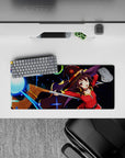 Megumin from Konosuba casting Explosion, vibrant colors, dynamic action, 28x12 inches anime mouse pad, enhances desk style.