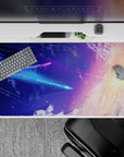 Cosmic calm 40x20 inches desk pad in deep blue, violet, and peach sunrise glow with sparkling stars.