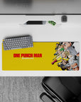 Bold yellow One Punch Man desk mat 32x12 inches, loud crisp colors for late-night gaming focus.