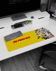 Saitama gliding forward in yellow suit with red gloves, Genos snarling on 32x12 inches anime mouse pad.