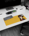 28x12 inches anime girl mouse pad showing sharp-eyed girl with short dark hair and orange streak on orange.