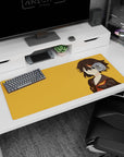 Smirking anime girl with short dark hair and orange streak on sailor uniform desk pad 36x16 inches.