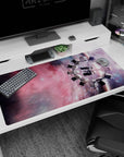 Spaceship in a spinning cosmic nebula desk pad, 40x20 inches, with fast streaking starfield.