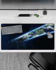 Midnight blue neon glow space mouse pad 32x16 inches, calm starry gradient with cool Earth halo.