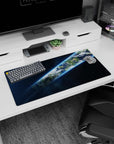 Tilted Earth ribbon through dark space mouse pad 32x16 inches, crisp clouds over oceans and land.