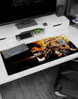 Artistic 36x16 inches mouse pad with Eren, Mikasa, and Armin soaring into battle, capturing their determination and flames in action.