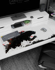Artistic 36x16 inches desk pad featuring Kaiju design, with energetic brush strokes and fiery red accents for a dramatic, action-packed workspace.