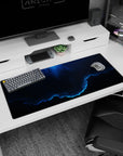 Starry night cloudscape desk pad 36x16 inches, smoky space scene with a bright neon-blue edge.