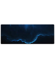 Midnight space swirl desk mouse pad 32x12 inches with neon-blue rim and scattered stars.