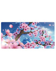 Sakura Blossoms Sky desk mat 32x16 featuring bright sky for gaming or workspace energy with graceful flair