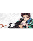 Tanjiro and Nezuko on a 36x16 inch Demon Slayer anime desk pad, capturing sibling power and fierce emotion.