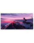32x16 inches anime mouse pad with rooftop skyline, schoolgirl, power lines, and graffiti hearts at dusk.