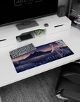 28x12 inches mouse pad featuring a calm redhead anime girl side pose, flowing ribbons, crown, mountain sky.