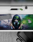 Moody gray-and-green anime desk pad 36x16 inches with neon-blue eyes, calm mist, and edgy vibe.