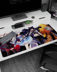 Ruby leads Team RWBY on an anime girl desk pad with bold poses and sharp stripe, 40x20 inches.