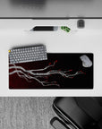 28x12 inches mouse pad with elegant branch design, featuring silver-gray branches and bold red blossoms for a serene and dramatic look.