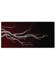 Mouse pad featuring elegant branch design, 32x16 inches, with silver-gray branches and red blossoms on a textured backdrop for serene sophistication.