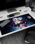 40x20 inches NieR:Automata desk pad showing 2B and A2 leaning close in a quiet dramatic moment.