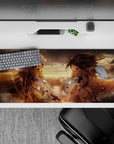 Powerful 36x16 desk pad with Eren's Attack Titan and Reiner's Armored Titan battling in a fiery, raw display of strength and rivalry