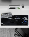 Anime mouse pad 32x12 inches in deep charcoal and silver with red eyes and electric blue accents, intense vibe.