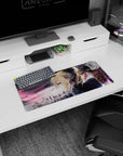 Violet Evergarden-inspired anime girl desk mat, wind-swept hair and sharp blue eye, 28x12 inches.