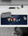 Deep navy anime mouse pad 32x12 inches with soft gray guild mark and bright chibi characters.