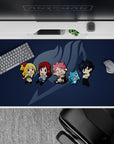 Navy and soft gray backdrop with bright chibi accents for a fun desk vibe, 40x20 inches anime desk pad.