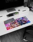 28x12 inches anime girl mouse pad showing wide-eyed idol winking, rose hair clip, reaching hands, confetti.