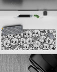 Black-and-white high-contrast anime girl mouse pad with playful sketchbook energy, 32x12 inches.