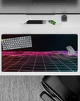 Dynamic 32x16 desk mat combines neon purples, pinks, and starry tones for impactful yet calming visuals
