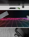 Immersive 40x20 desk pad showcases purple and pink hues with a sleek digital grid for a futuristic workspace vibe