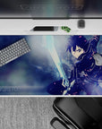 Kirito from Sword Art Online on a 40x20 inch anime desk pad, showcasing dynamic motion with icy blues and electric details.