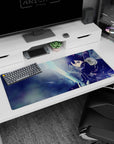 Kirito from Sword Art Online on a 36x16 inch anime mouse pad, showcasing intense energy with icy blues and dynamic motion.