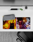 Orange flame vs purple lightning anime mouse pad, high-drama chakra sparks, 28x12 inches.