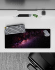 Calming black, purple and blush nebula mouse pad 28x12 inches with speckled stars for smooth tracking.